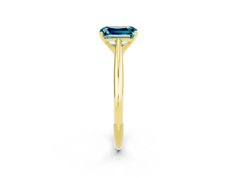 Yellow gold Emerald Cut Blue Topaz Solitaire Engagement Ring with Cathedral Setting and Four-Prong Mount_14