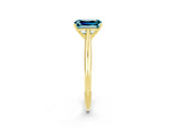 Yellow gold Emerald Cut Blue Topaz Solitaire Engagement Ring with Cathedral Setting and Four-Prong Mount_32