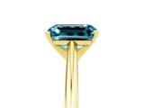 Yellow gold Emerald Cut Blue Topaz Solitaire Engagement Ring with Cathedral Setting and Four-Prong Mount_35