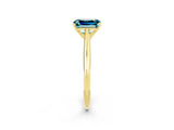 Yellow gold Emerald Cut Blue Topaz Solitaire Engagement Ring with Cathedral Setting and Four-Prong Mount_68