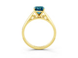 Yellow gold Emerald Cut Blue Topaz Solitaire Engagement Ring with Cathedral Setting and Four-Prong Mount_69