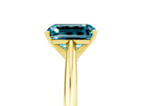 Yellow gold Emerald Cut Blue Topaz Solitaire Engagement Ring with Cathedral Setting and Four-Prong Mount_71