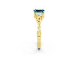 Yellow gold Emerald Cut Blue Topaz Solitaire Engagement Ring with Celtic Knot Band and Four-Prong Setting_2