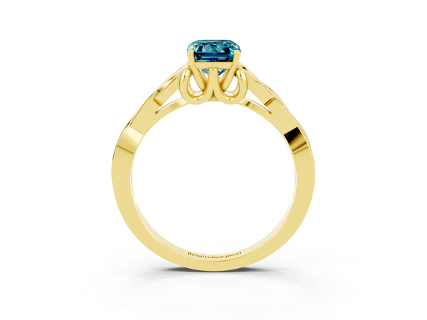 Yellow gold Emerald Cut Blue Topaz Solitaire Engagement Ring with Celtic Knot Band and Four-Prong Setting