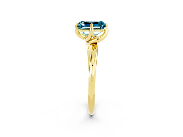 Yellow gold Emerald Cut Blue Topaz Solitaire Engagement Ring with Four-Prong Setting and Classic Band