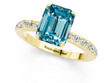 Yellow gold Emerald Cut Blue Topaz Solitaire Engagement Ring with Pavé Band and Four-Prong Setting_1