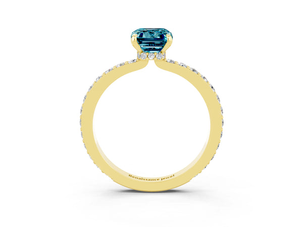 Yellow gold Emerald Cut Blue Topaz Solitaire Engagement Ring with Pavé Band and Four-Prong Setting