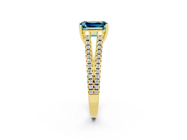 Yellow gold Emerald Cut Blue Topaz Solitaire Engagement Ring with Split Shank Pavé Band