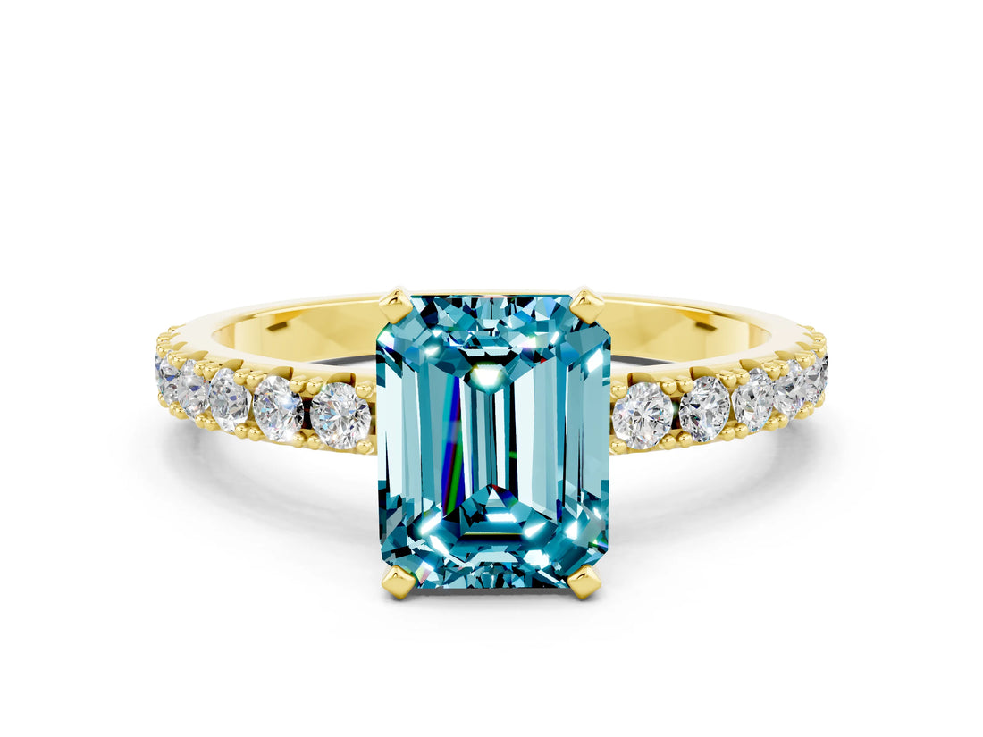 Yellow gold Emerald Cut Blue Topaz Solitaire Pavé Band with Four-Prong Setting