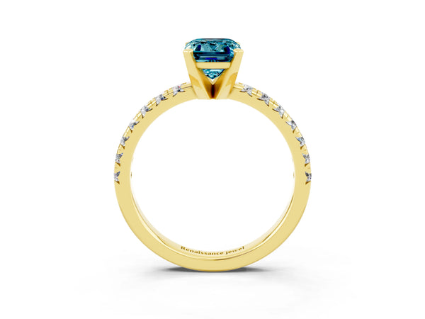 Yellow gold Emerald Cut Blue Topaz Solitaire Pavé Engagement Ring with Round Band and Prong Setting