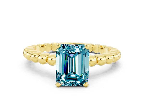 Yellow gold Emerald Cut Blue Topaz Solitaire Ring with Beaded Band and Prong Setting