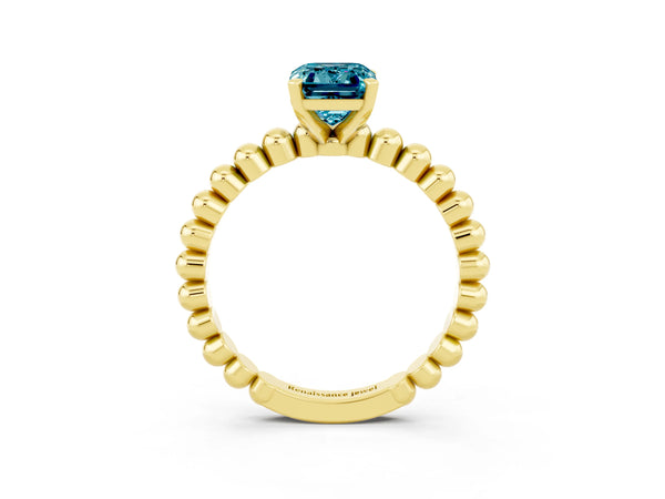 Yellow gold Emerald Cut Blue Topaz Solitaire Ring with Beaded Band and Prong Setting