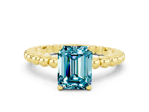 Yellow gold Emerald Cut Blue Topaz Solitaire Ring with Beaded Band and Prong Setting