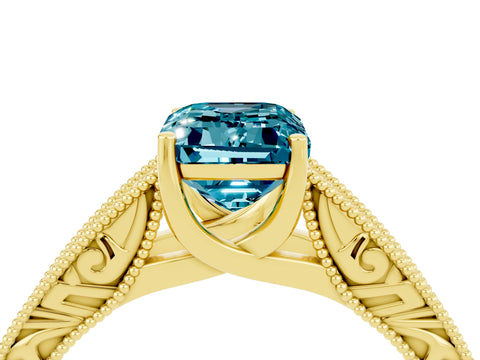Yellow gold Emerald Cut Blue Topaz Solitaire Ring with Engraved Band and Four-Prong Setting_4