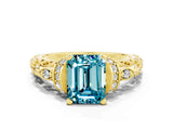 Yellow gold Emerald Cut Blue Topaz Solitaire Ring with Filigree Band and Four-Prong Setting_24