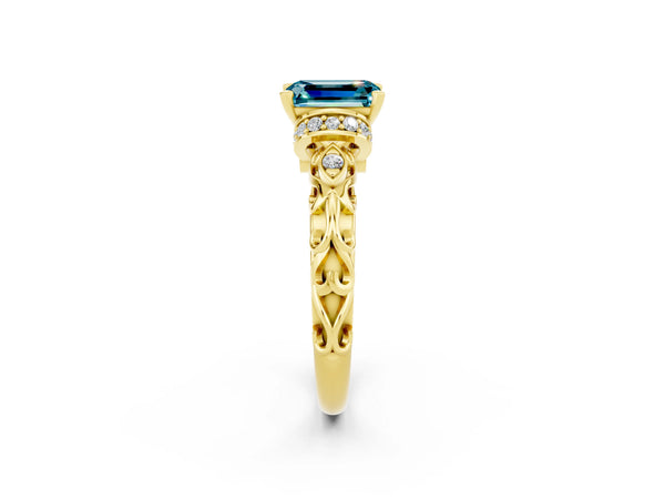 Yellow gold Emerald Cut Blue Topaz Solitaire Ring with Filigree Band and Four-Prong Setting