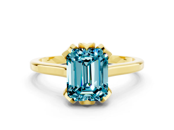 Yellow gold Emerald Cut Blue Topaz Solitaire Ring with Flower Prong Setting and Classic Band