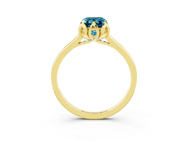 Yellow gold Emerald Cut Blue Topaz Solitaire Ring with Flower Prong Setting and Classic Band