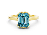 Yellow gold Emerald Cut Blue Topaz Solitaire Ring with Flower Prong Setting and Classic Band_36