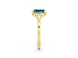 Yellow gold Emerald Cut Blue Topaz Solitaire Ring with Flower Prong Setting and Classic Band_38