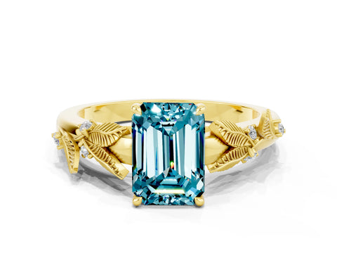 Yellow gold Emerald Cut Blue Topaz Solitaire Ring with Leaf Motif Band and Four-Prong Setting