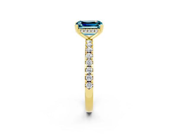 Yellow gold Emerald Cut Blue Topaz Solitaire Ring with Round  Pavé Band and Four-Prong Setting