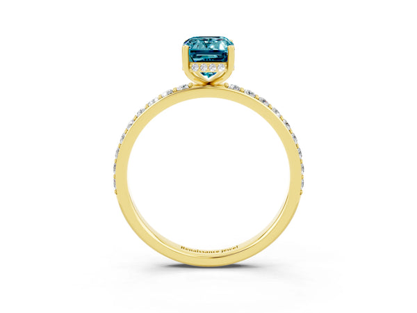 Yellow gold Emerald Cut Blue Topaz Solitaire Ring with Pavé Band and Hidden Halo