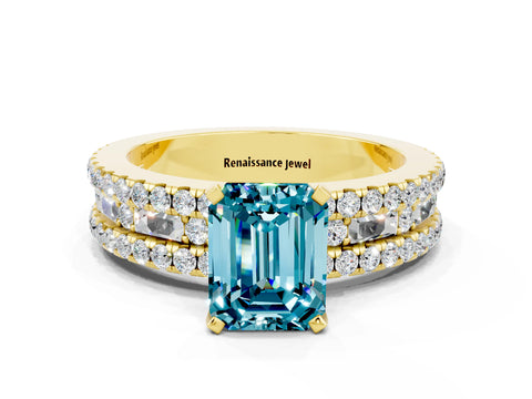 Yellow gold Emerald Cut Blue Topaz Solitaire Ring with Pavé and Channel Set Band