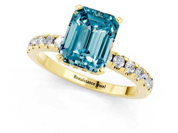 Yellow gold Emerald Cut Blue Topaz Solitaire Ring with Round  Pavé Band and Four-Prong Setting