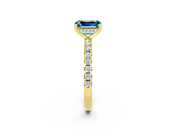 Yellow gold Emerald Cut Blue Topaz Solitaire Ring with Round  Pavé Band and Four-Prong Setting
