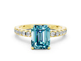 Yellow gold Emerald Cut Blue Topaz Solitaire Ring with Round  Pavé Band and Four-Prong Setting_36