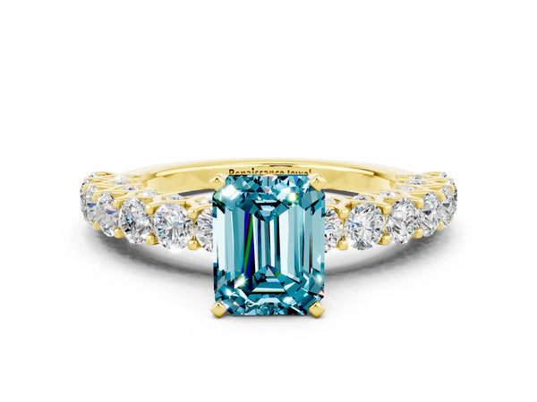 Yellow gold Emerald Cut Blue Topaz Solitaire Ring with Shared Prong Pavé Band and Four-Prong Setting