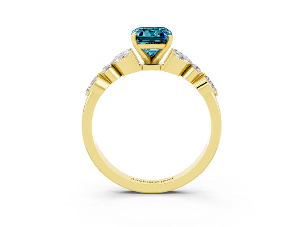 Yellow gold Emerald Cut Blue Topaz Solitaire Ring with Side Stones and Four-Prong Setting