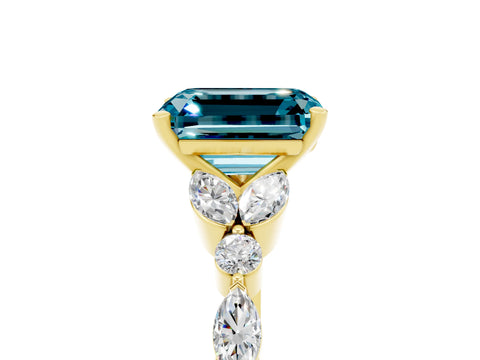 Yellow gold Emerald Cut Blue Topaz Solitaire Ring with Side Stones and Four-Prong Setting_17