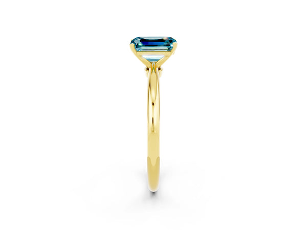 Yellow gold Emerald Cut Blue Topaz Solitaire Ring with Six-Prong Setting and Classic Band