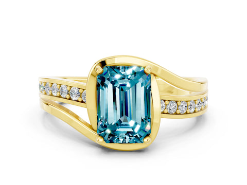 Yellow gold Emerald Cut Blue Topaz Solitaire Ring with Split Shank and Prong Setting