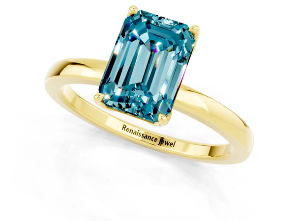 Yellow gold Emerald Cut Blue Topaz Solitaire Ring with Thin Band and Prong Setting