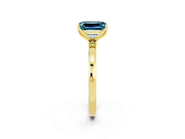 Yellow gold Emerald Cut Blue Topaz Solitaire Ring with Thin Band and Prong Setting