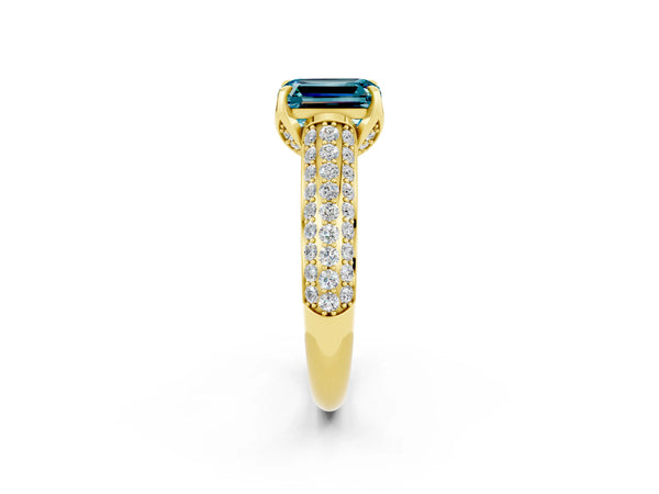 Yellow gold Emerald Cut Blue Topaz Solitaire Ring with Three-Row Pavé Band and Four-Prong Setting