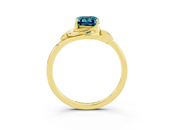 Yellow gold Emerald Cut Blue Topaz Solitaire Ring with Twist Band and Four-Prong Setting