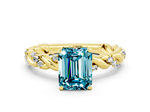 Yellow gold Emerald Cut Blue Topaz Solitaire Ring with Twisted Band and Pavé Accents
