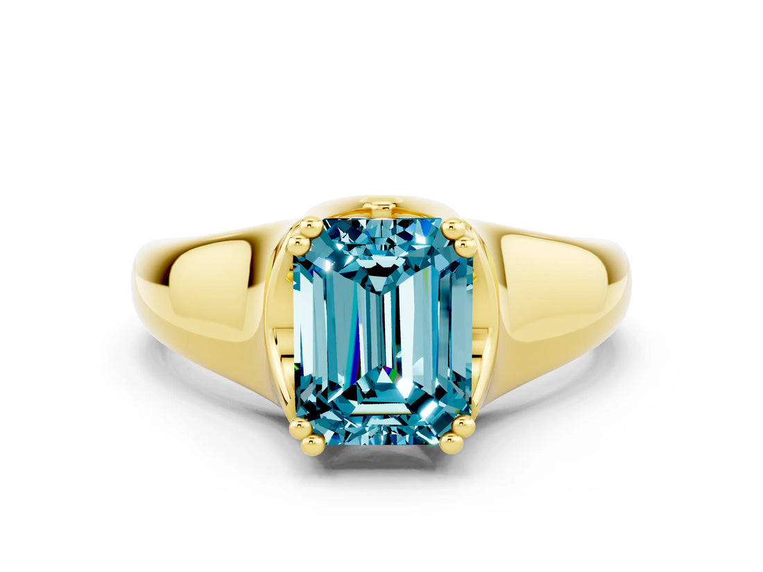 Yellow gold Emerald Cut Blue Topaz Solitaire Ring with Wide Band and Prong Setting