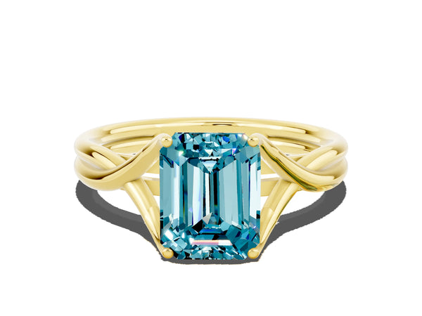Yellow gold Emerald Cut Blue Topaz Solitaire Twist Band Prong Setting Ring