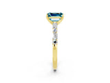 Yellow gold Emerald Cut Blue Topaz Solitaire with Side Baguettes and Channel Set Band_2