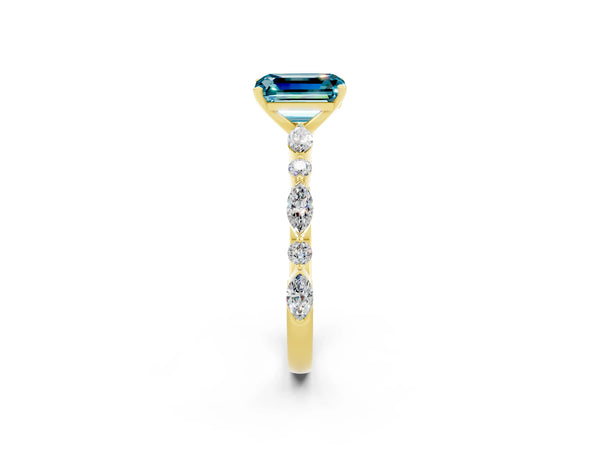 Yellow gold Emerald Cut Blue Topaz Ring with Marquise and Round  Side Stones and Four-Prong Setting