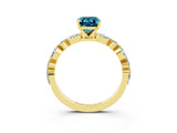 Yellow gold Emerald Cut Blue Topaz Solitaire with Side Stones on a Pavé Band and Four-Prong Setting_3