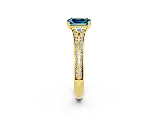 Yellow gold Emerald Cut Blue Topaz Split Shank Engagement Ring with Pavé Band