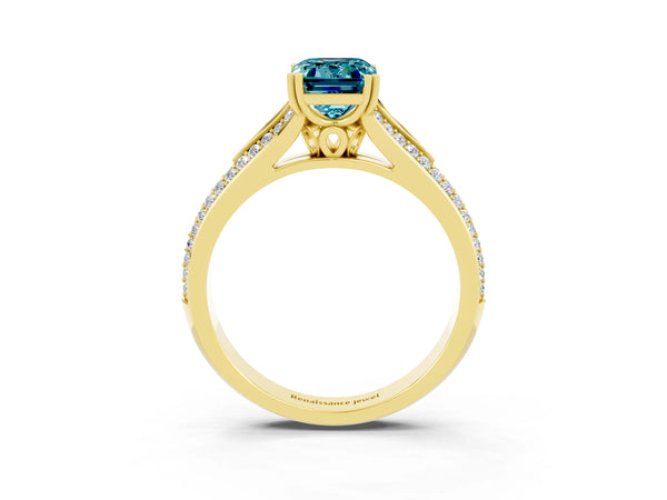 Yellow gold Emerald Cut Blue Topaz Split Shank Engagement Ring with Pavé Band