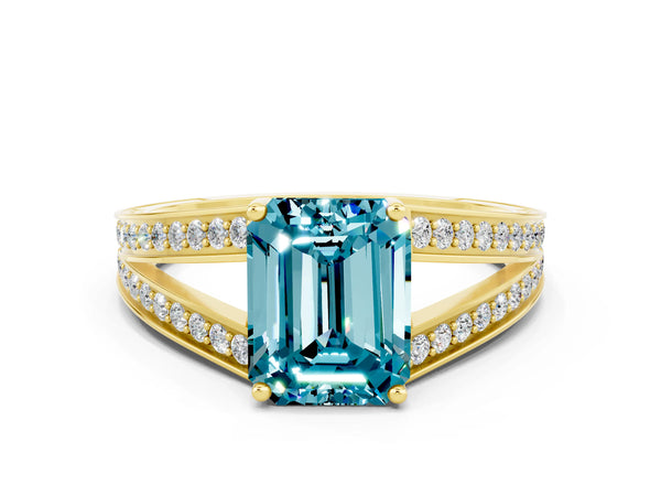 Yellow gold Emerald Cut Blue Topaz Split Shank Ring with Pavé Band and Four-Prong Setting