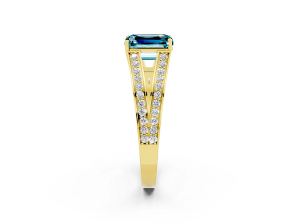 Yellow gold Emerald Cut Blue Topaz Split Shank Ring with Pavé Band and Four-Prong Setting